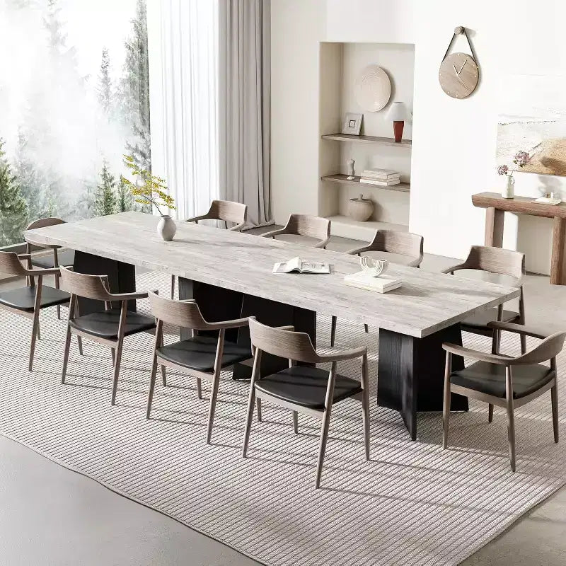 Table de salle à manger longue et moderne avec grand plateau et pieds à piédestal robustes