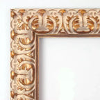 Miroir mural encadré en bois biseauté doré