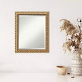 Miroir mural encadré en bois biseauté doré