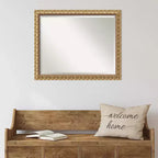 Miroir mural encadré en bois biseauté doré